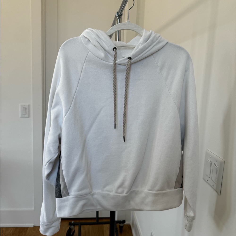 Vuori White Hoodie. Pullover style. Grey stripes on side.